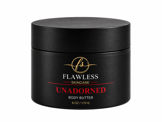 A black cosmetic jar of Flawless Skincare fragrance free Unadorned Body Butter, 6 oz / 170 g, on a solid white background.